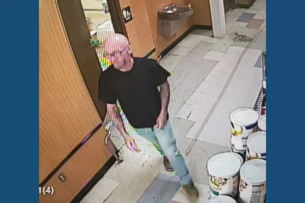 Suspect wanted for allegedly robbing the Citizens Bank branch inside the Acme in Runnemede NJ - Photo: Camden County Prosecutor's Office